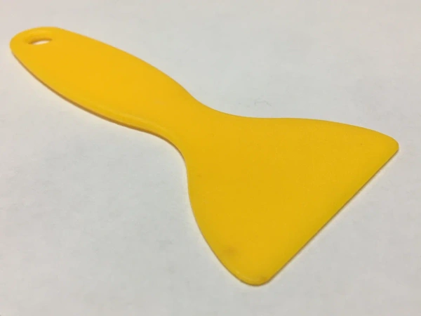 Выгонка в виде лопатки желтая